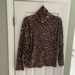 Woman’s leopard turtle neck
